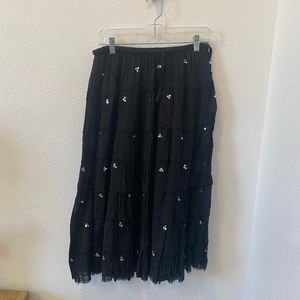 Long black skirt with silver sequence